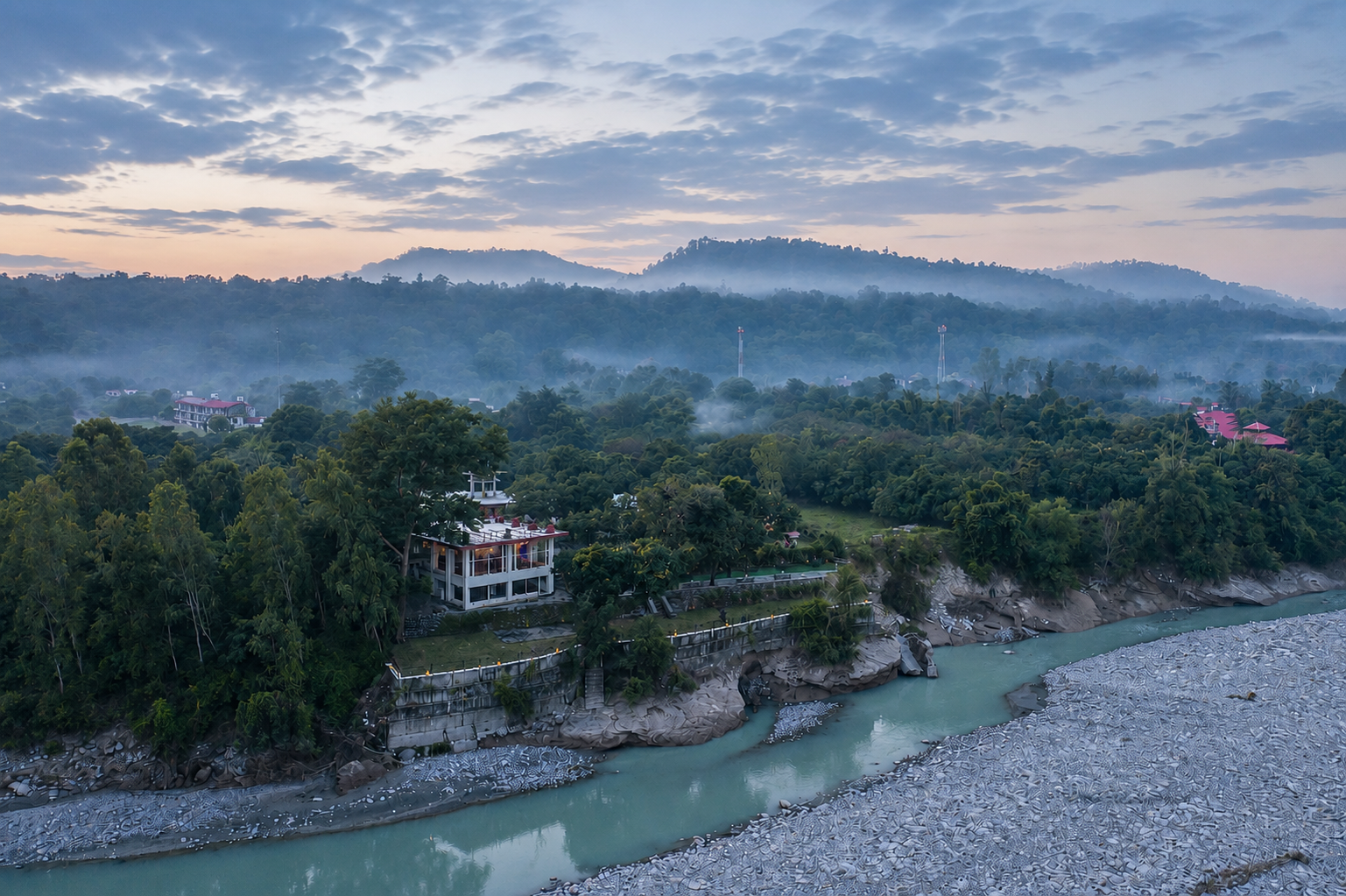 Aerial view of La Perle River Resort beside the Kosi river in Jim Corbett