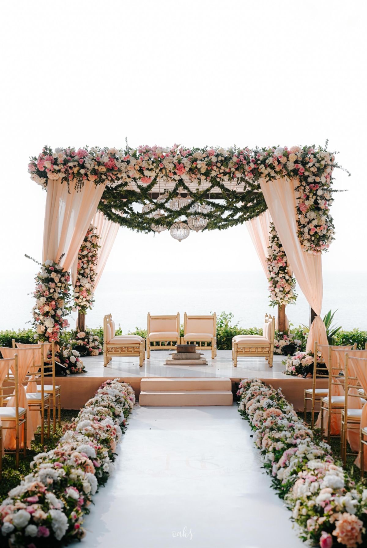 Floral wedding mandap set up at La Perle River Resort, Jim Corbett